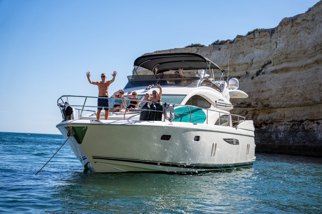Group of friends enjoying private yacht experience in Algarve