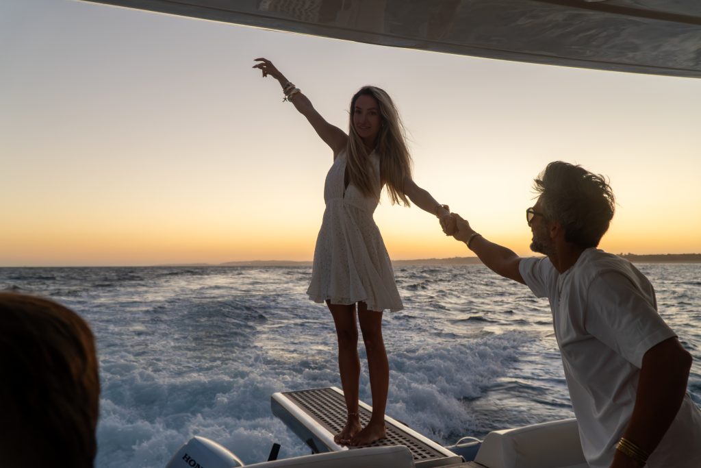 Luxury yacht experience Algarve exploring hidden beaches at sunset
